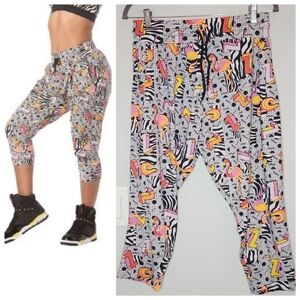 Zumba Cropped Harem Stretch Pants. Flamingo. Size medium. Drawstring. Pockets.